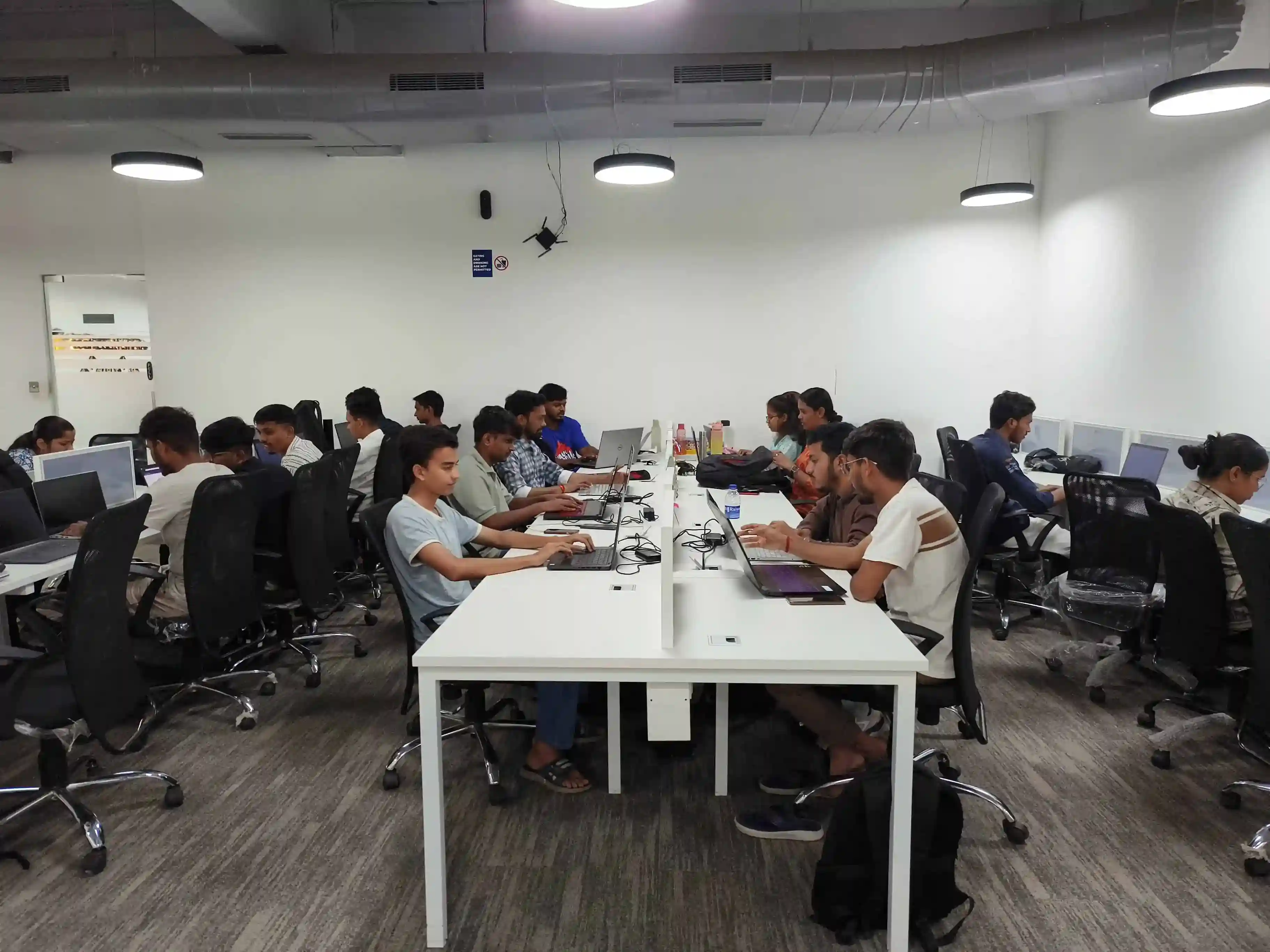Students working in a real startup training environment at Techpaathshala